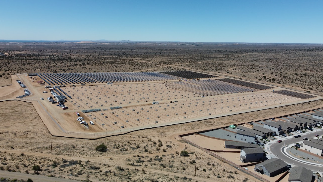 Aerial view of ASG solar farm with Rio Rancho Event Center visible in the background